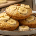 Banana bread muffin cookies with pecans and banana slices, served on a plate